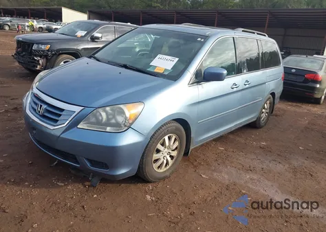 2010 Honda Odyssey Ex-L z USA, uszkodzony, nr VIN 5FNRL3H71AB094152